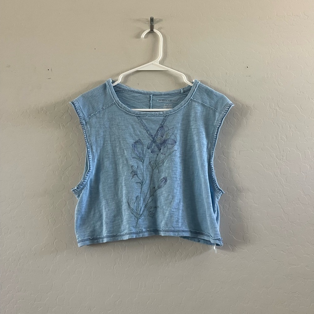 Blue Sleeveless Top with Floral Design